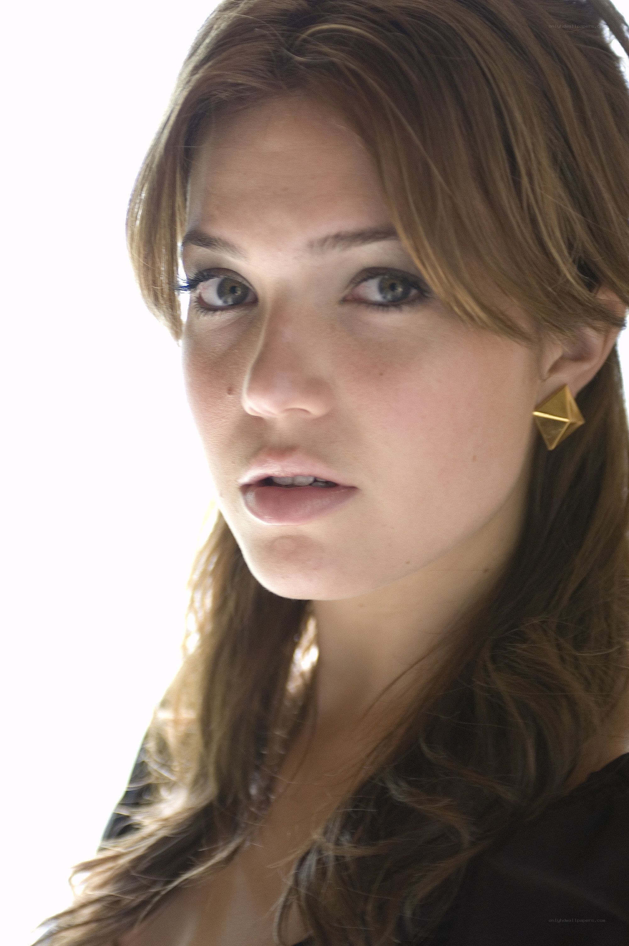 woman with gold earring