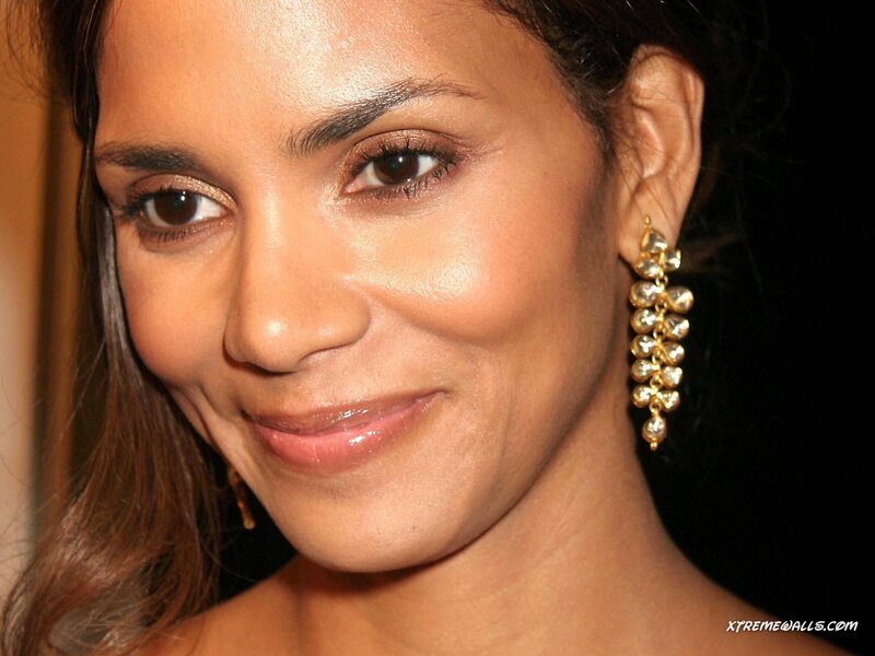 woman with gold earrings