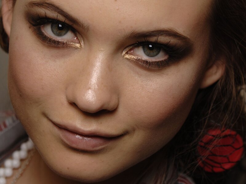 woman with gold eyeshadow