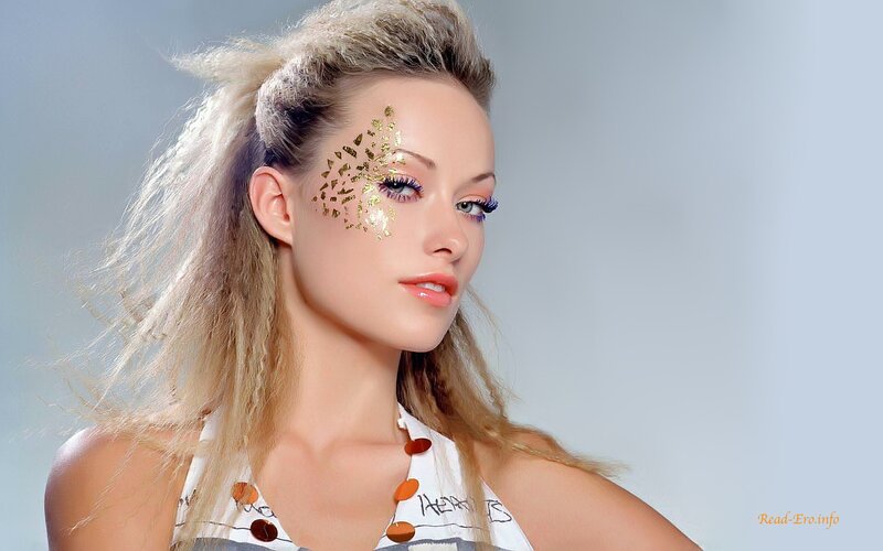 woman with gold face art