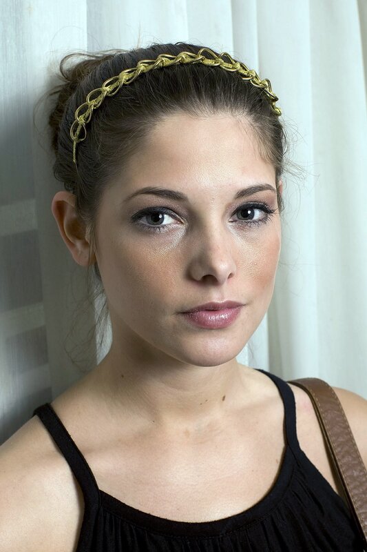 woman with gold headband