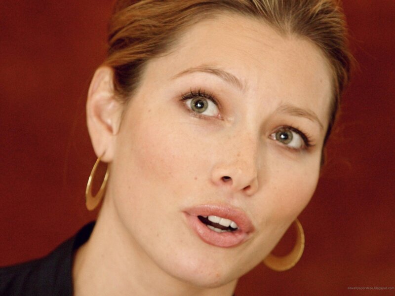woman with gold hoop earrings