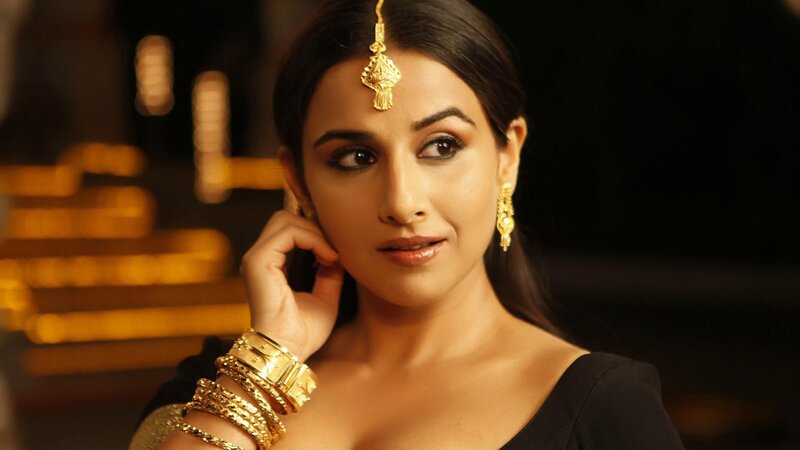 Woman with Gold Jewelry — Black, Dramatic
