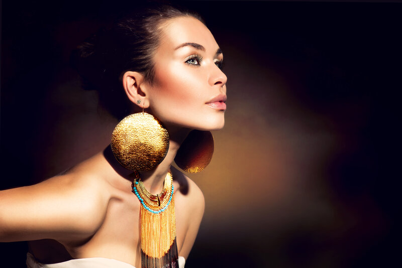 Woman with Gold Jewelry — Dramatic, Photograph, Earrings