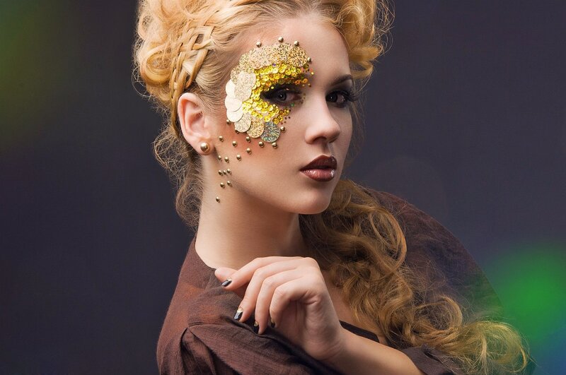 Woman with Gold Makeup — Brown