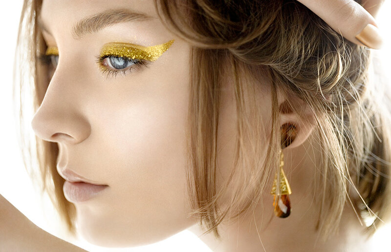Woman with Gold Makeup — Dramatic, Photograph