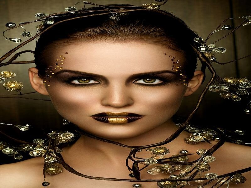 Woman with Gold Makeup — Dramatic