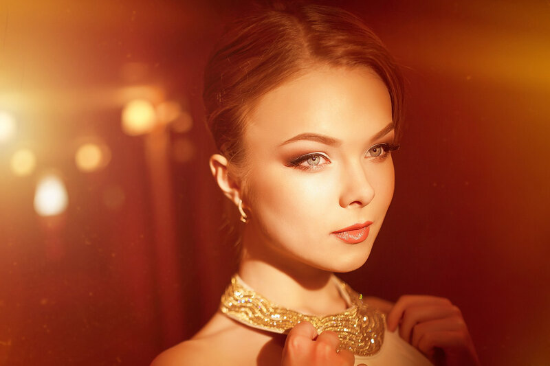 Woman with Gold Necklace — Dramatic