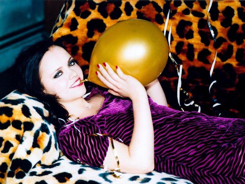 Woman with golden balloon