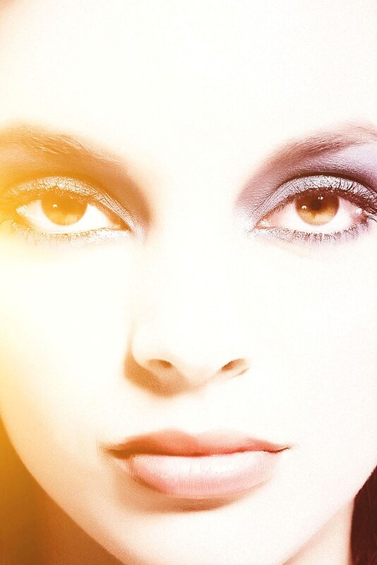 woman with golden eye makeup