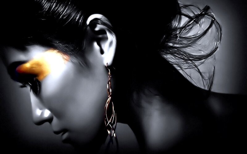 woman with golden eye makeup