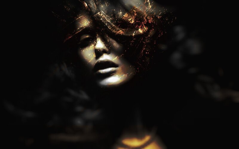 woman with golden face art
