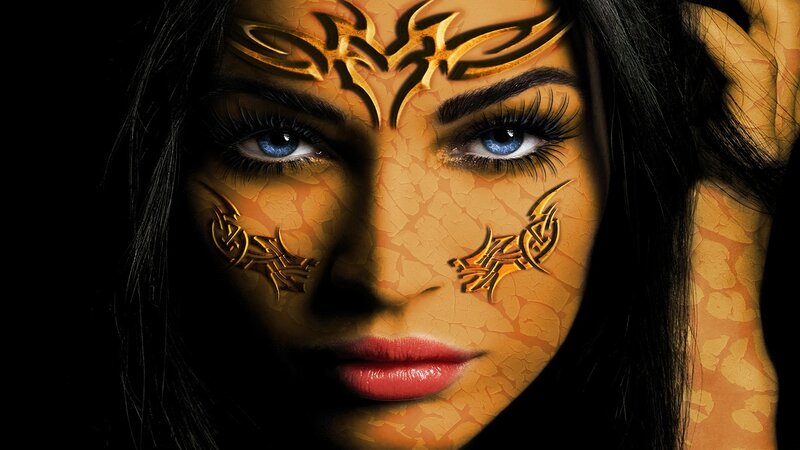 Woman with Golden Face Paint — Gold, Dramatic