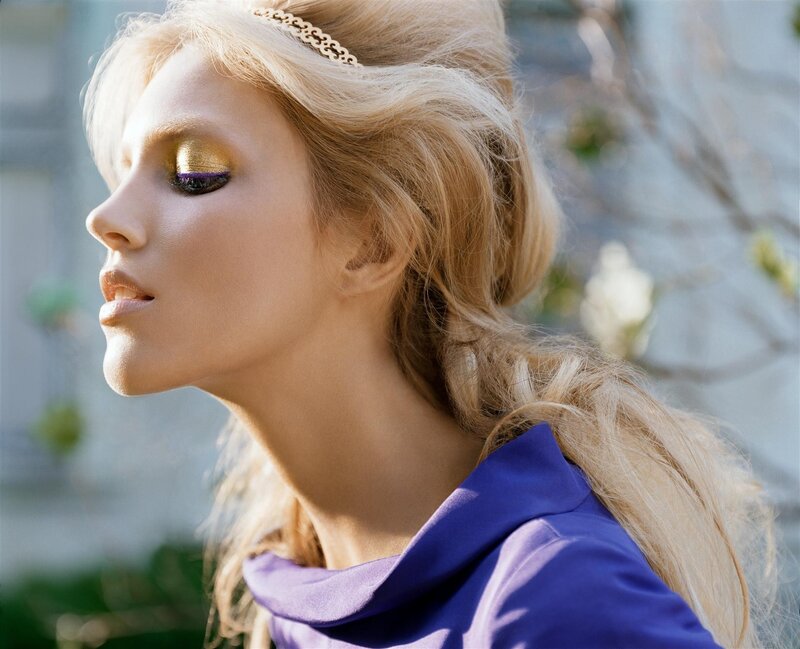 woman with golden makeup