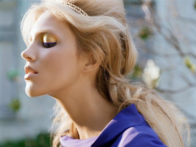 woman with golden makeup