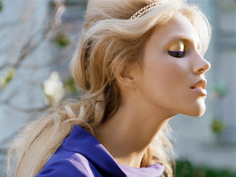 woman with golden makeup