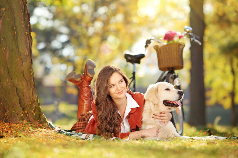 Woman with Golden Retriever — Green, Serene, Autumn