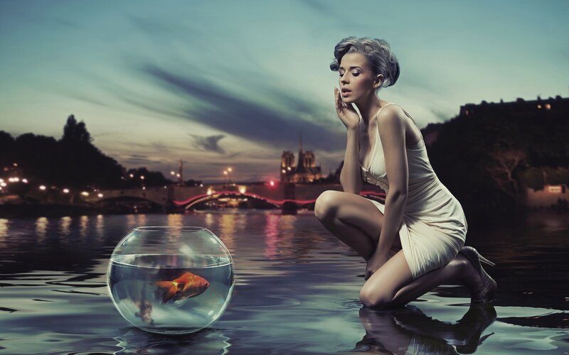 woman with goldfish bowl