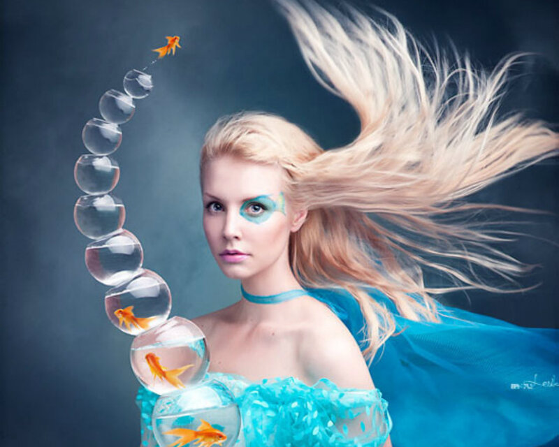 Woman with Goldfish Bubbles