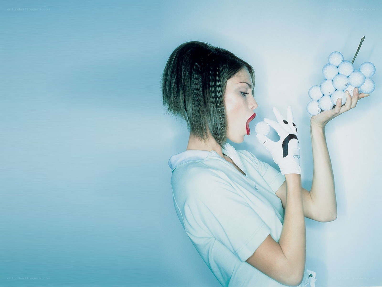 woman with golf balls