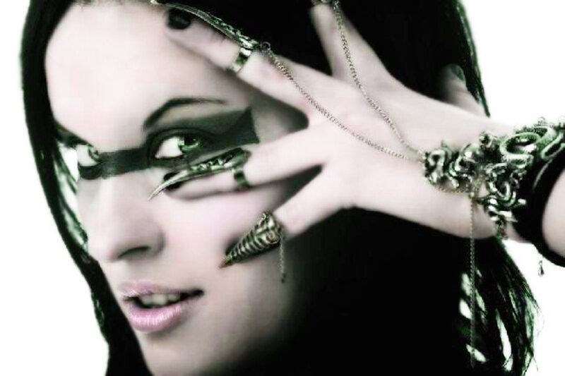 woman with gothic makeup and jewelry