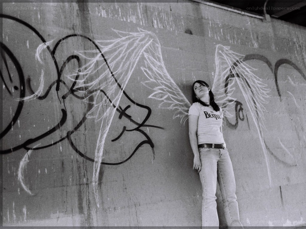 woman with graffiti wings