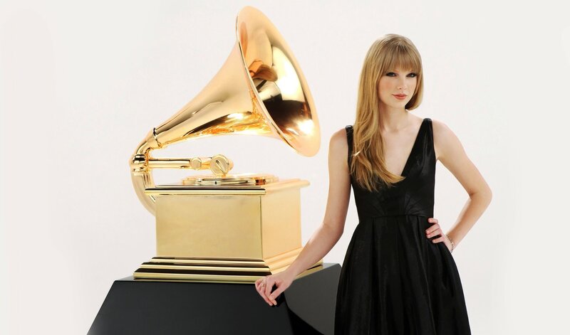 Woman with Grammy Award