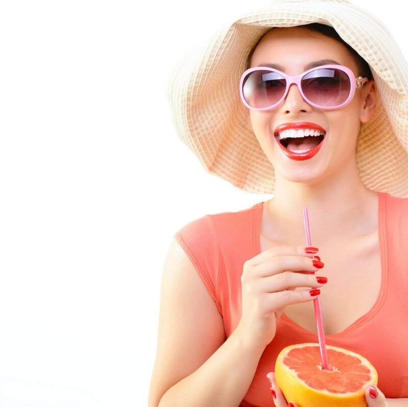 Woman with Grapefruit Drink