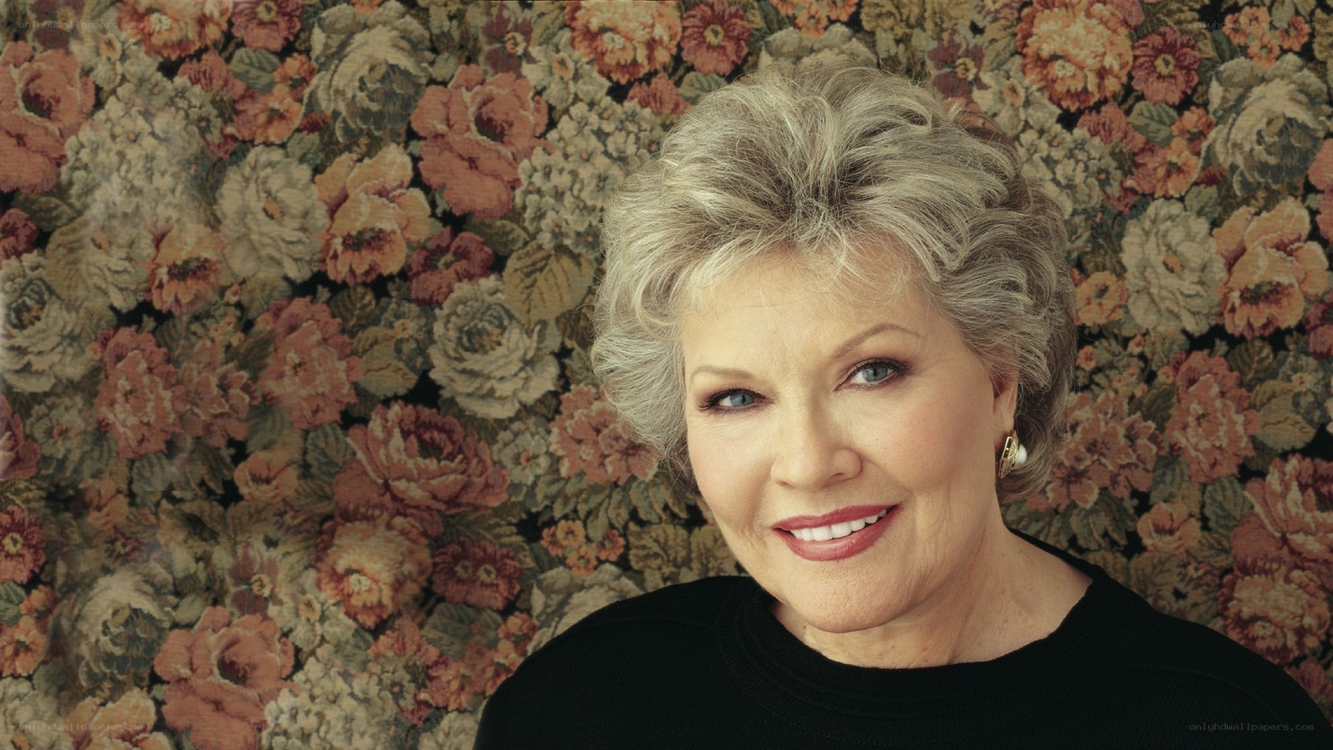 woman with gray hair smiling