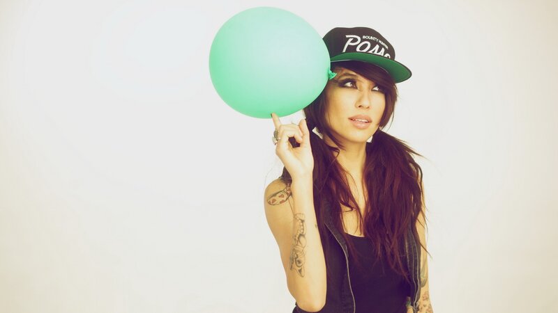 woman with green balloon