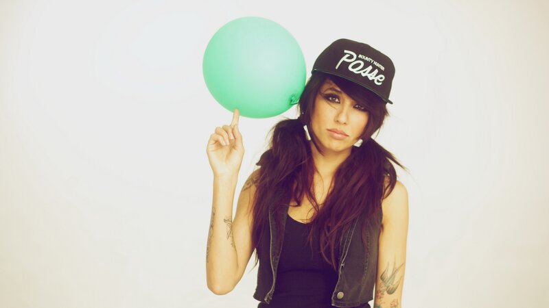 woman with green balloon