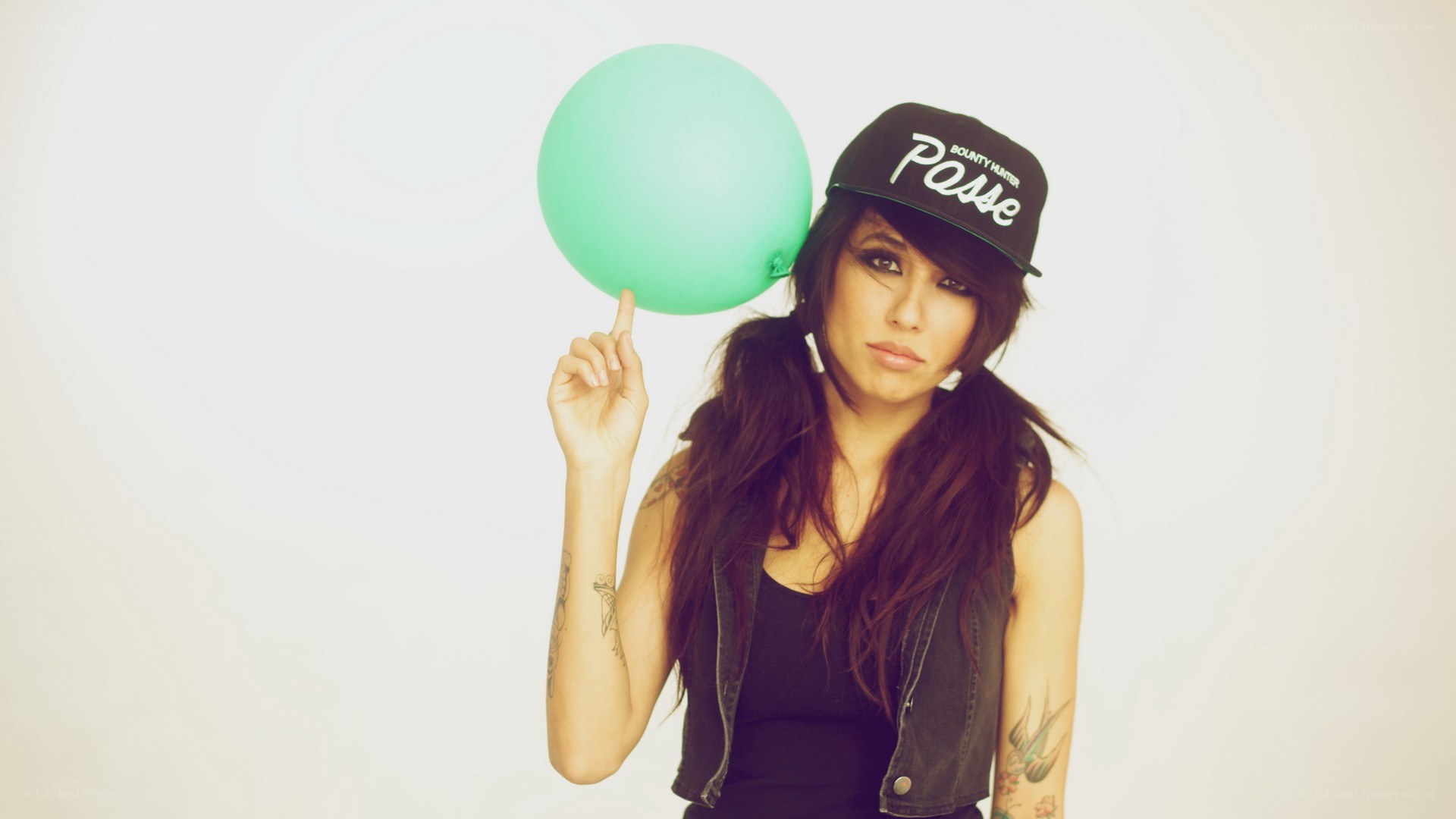 woman with green balloon