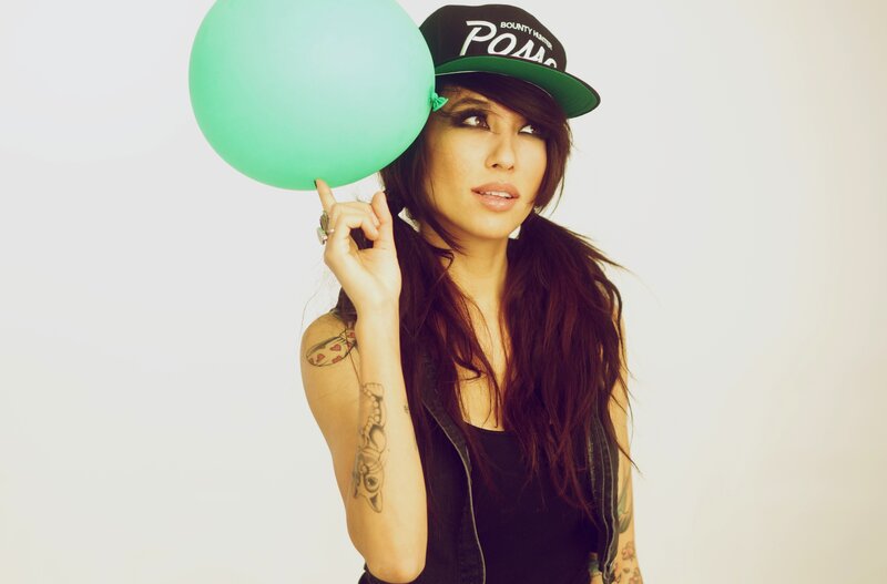 woman with green balloon
