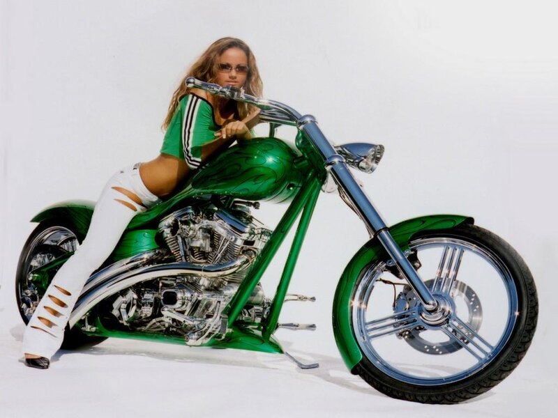 woman with green chopper motorcycle