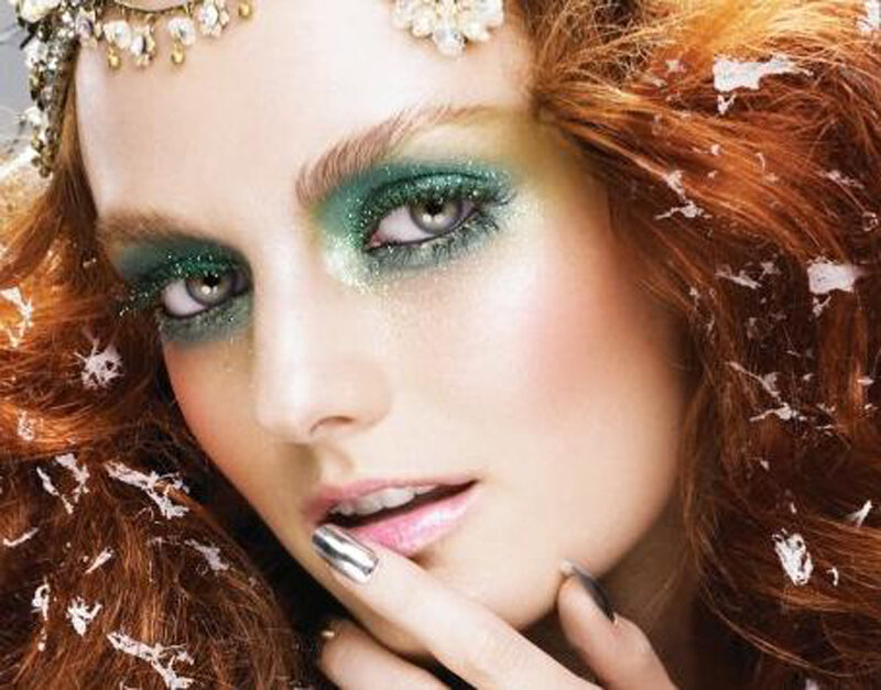 woman with green eye makeup