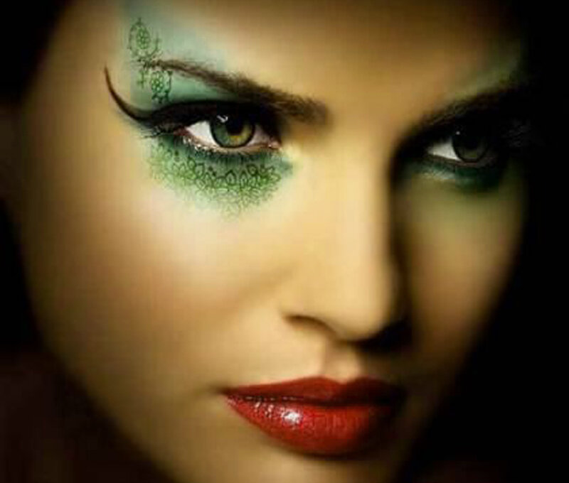 woman with green eye makeup