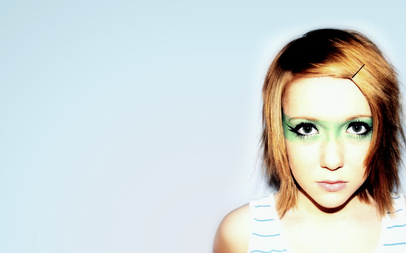 woman with green eye makeup