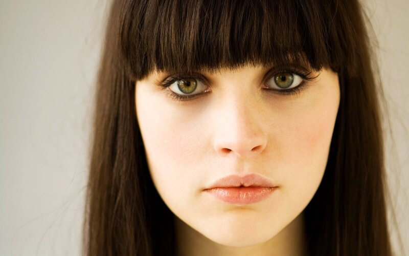 woman with green eyes and bangs