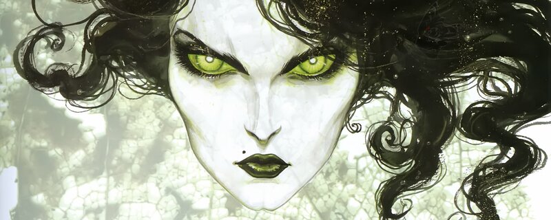 woman with green eyes and black hair