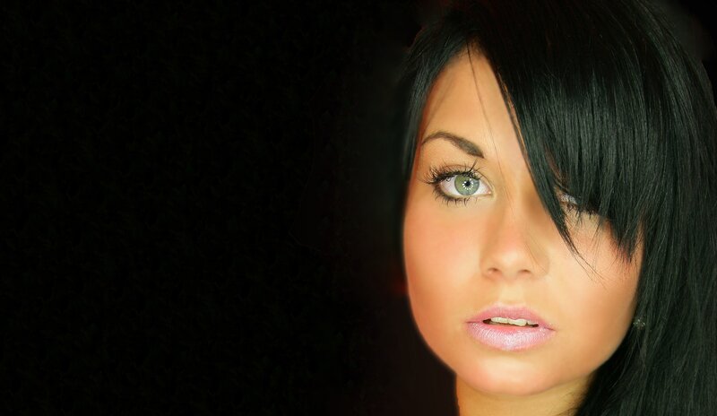 woman with green eyes and black hair