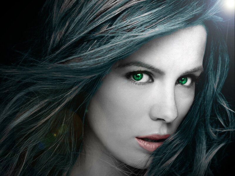 woman with green eyes and blue hair