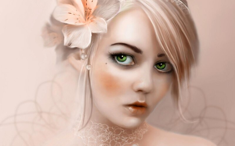 woman with green eyes and flower