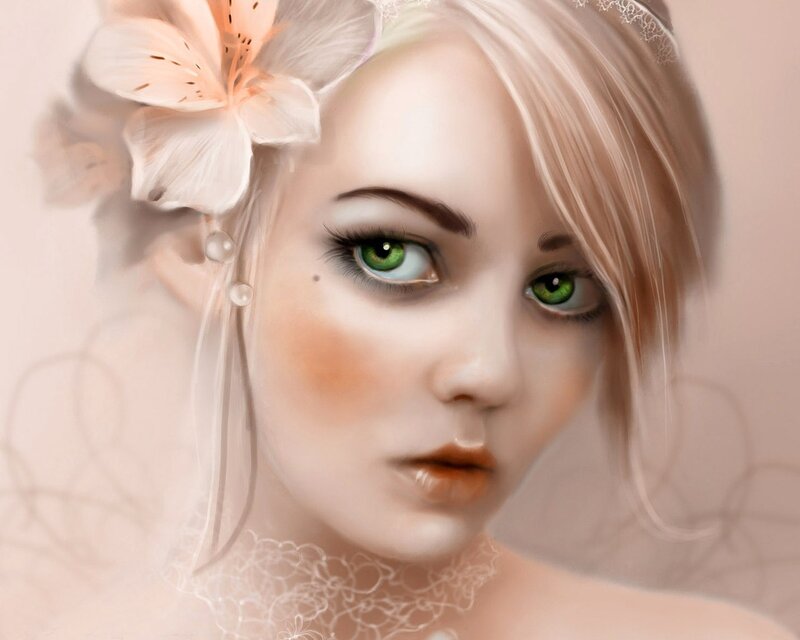 woman with green eyes and flower