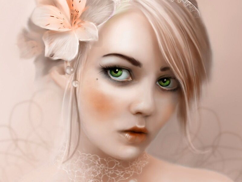 woman with green eyes and flower