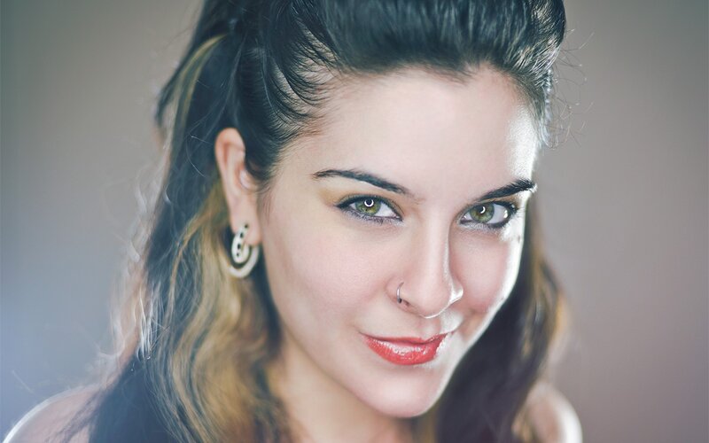woman with green eyes and red lipstick