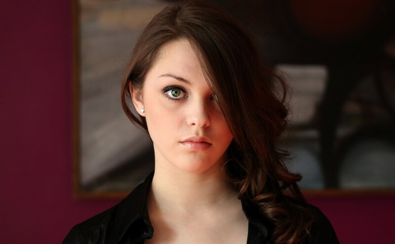 Woman with Green Eyes — Brown, Serious, Photograph, Earring