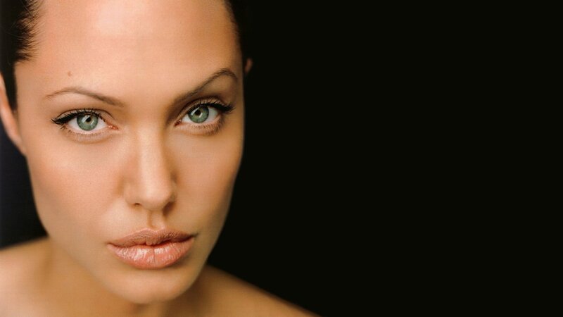 Woman with Green Eyes — Brown, Serious, Photograph
