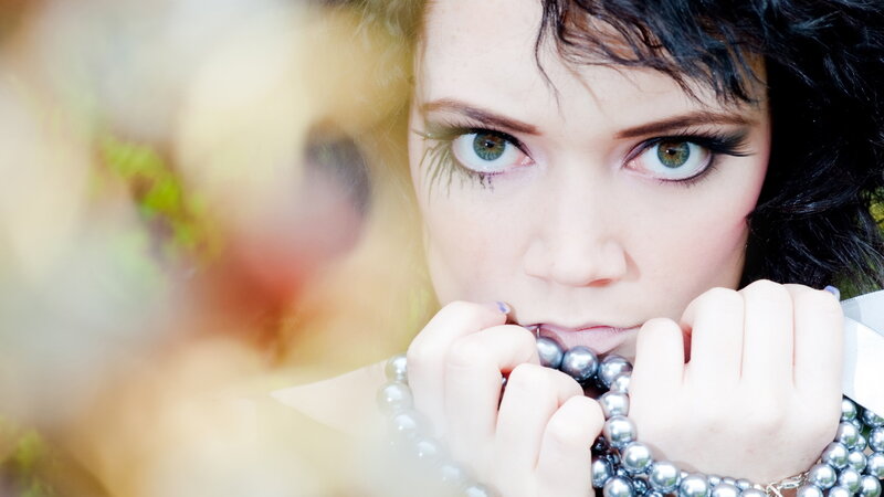 Woman with Green Eyes — Dramatic, Photograph, Pearl Necklace