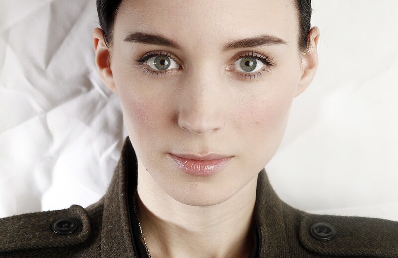 woman with green eyes in coat