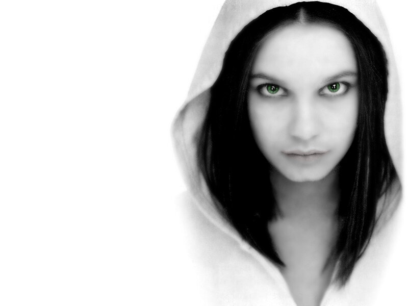 woman with green eyes in hoodie